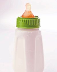 A bottle of soothing milk can help put a child to sleep.