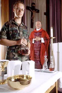 USAF Airman serving as a Chaplain Service Support Personnel: During wartime, his primary responsibility is to provide security for the Chaplain due to laws in the Geneva Convention that make it necessary for religious and medical personnel to be unarmed.