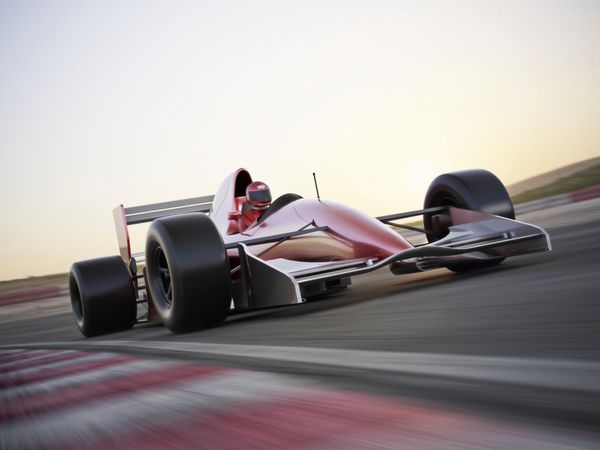 Racecar in motion as viewed from low angle