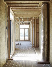 A home that's mid-construction displaying the components of a radiant heating system.&nbsp;&nbsp;