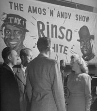 A quartet sings during a commercial to advertise "Amos 'n' Andy."