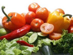 Different fresh tasty vegetables isolated on white background.