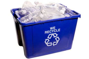 Recycling bin full of bottles