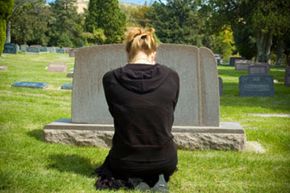 woman at graveside