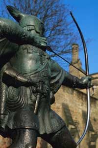 Tourist Attractions Image Gallery This Robin Hood statue is stationed outside of a castle in Nottinghamshire, England. See more pictures of tourist attractions.