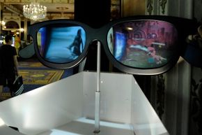 Not for actual use: A huge pair of RealD 3-D glasses on display at ShoWest in 2010.