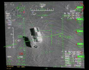 During a training mission at Creech Air Force Base, a pilot's display at the ground control station shows a truck from the view of a camera on an MQ-9 Reaper.
