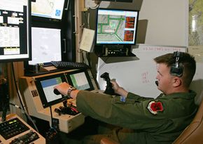 Air Force Senior William Swain operates a sensor control for an MQ-9 Reaper during a training mission on Aug. 8, 2007, at Creech Air Force Base.