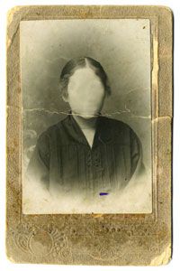 old photograph of woman with faded face