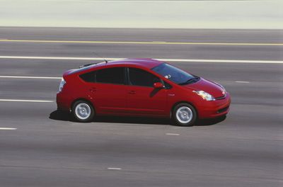 Hybrid car on highway.