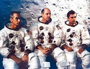 The three primary crew members for the Apollo 10 mission (Eugene A. Cernan, Thomas P. Stafford and John W. Young) pose in front of a large map of the lunar surface. They launched on May 18, 1969.