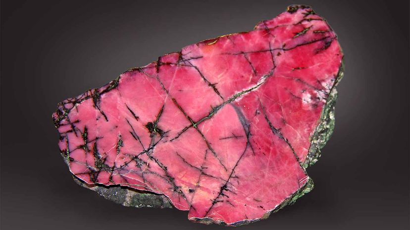 The pink marble and dark swirls of rhodonite stone