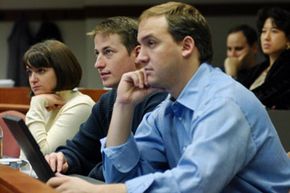 A group of Babson College MBA students attend a marketing class in 2003. Marketing is one of many required classes, but it's the electives that may determine your future salary.