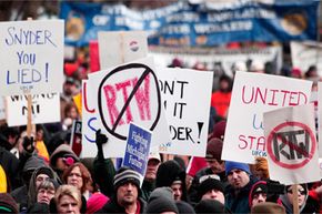 Union members from around the U.S. rallied at the Michigan State Capitol to protest a vote on right-to-work legislation on Dec. 11, 2012, in Lansing, Mich. See more protesting pictures.