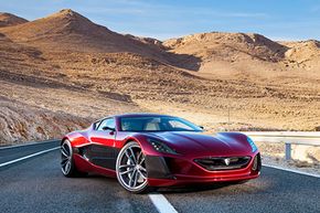 以980000美元的价格标签和惊人的性能规格,在Rimac Concept_One甚至不是试图伪装成一个负责任的选择。”width=