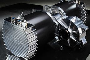 Concept_One的四个轮子都有自己的油冷马达、逆变器和减速箱。＂border=