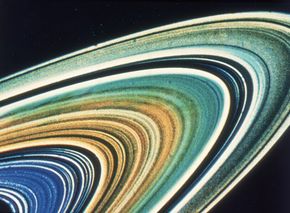 The enhanced color of an image returned by the Voyager 2 shows a level of detail unseen by Galileo.