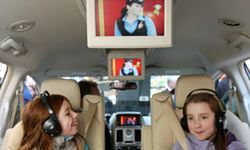 kids watching DVD player