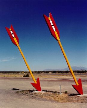 The Arrow Statues plunging into the Colorado Plateau are all that remain of advertising for the Twin Arrows Trading Post in Arizona.