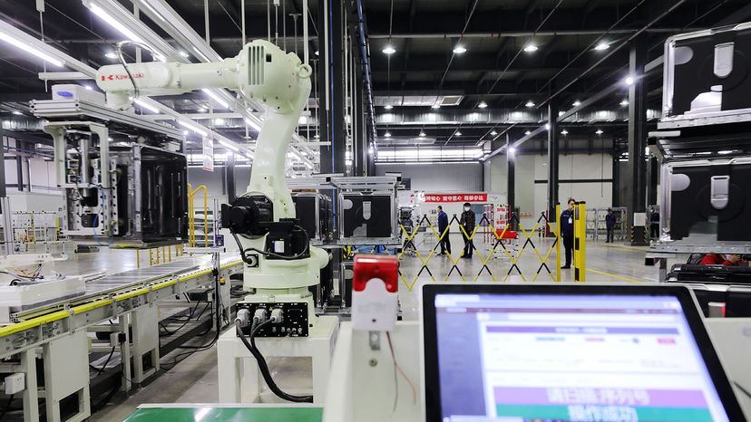 robotic arm produces dishwashers 