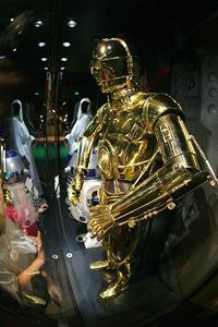 Will we ever have robots like C3P0 and will they in turn change us? See more robot pictures.