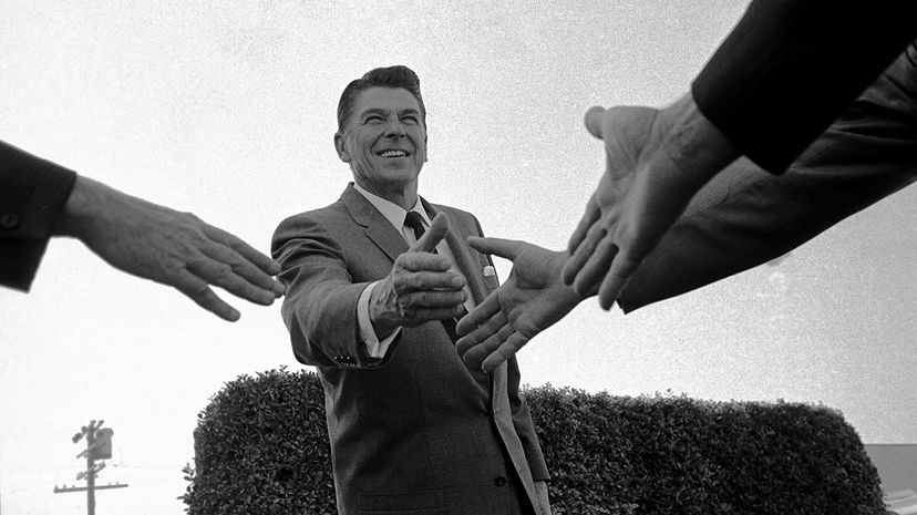 Ronald Reagan, pictured here while campaigning for the California governership, is often cited as one of the more charismatic modern American leaders. Supporters reach out in this 1965 image to shake hands with the future U.S. president. Bettmann Archive/Getty Images