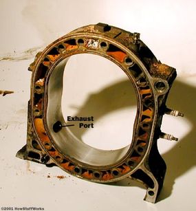 The part of the rotor housing that holds the rotors (Note the exhaust port location.)