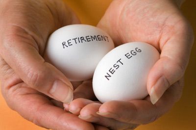 Hands holding eggs marked RETIREMENT and NEST EGG