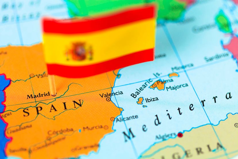 map and flag of Spain