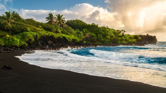 A Guide To The World's Most Beautiful Black Sand Beaches