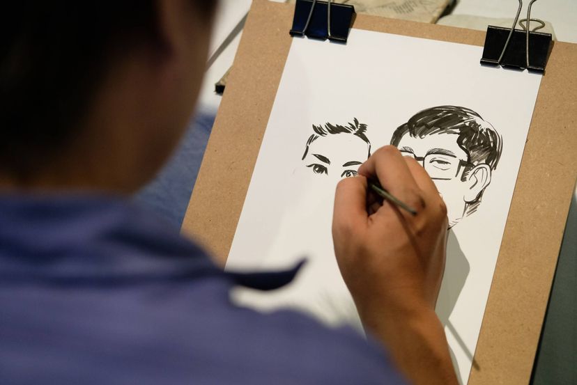 Man Drawing Caricatures