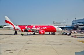 airplane parked by airport