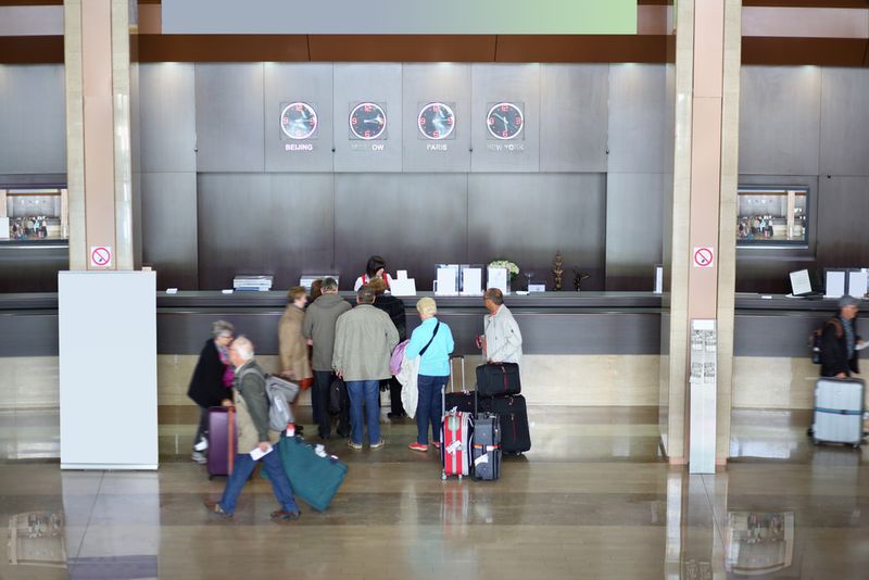 Guests at hotel check in