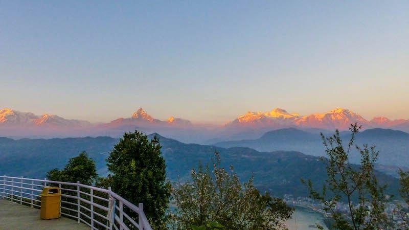 The sun setting over Pokhara and surrounding valleys