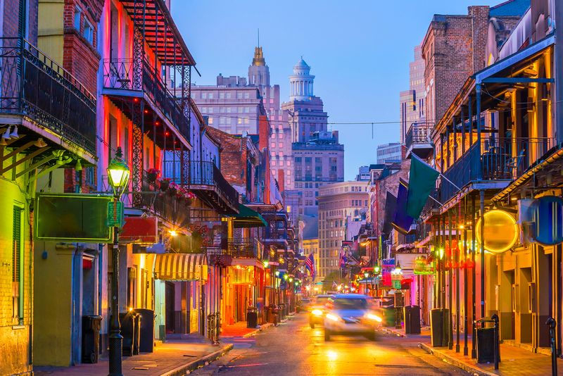 New Orleans, Louisiana colorful downtown streets at night