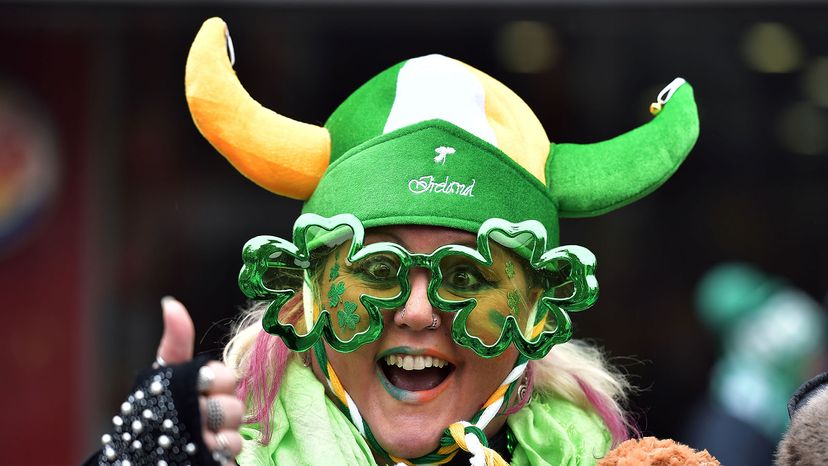 St. Patrick's Day parade, wearing shamrock-shaped glasses,
