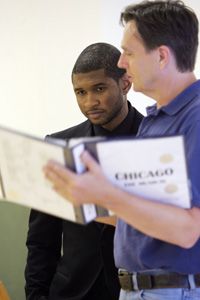Stage managers schedule and run rehearsals. Usher, left, rehearses for &quot;Chicago&quot; with stage manager David Hyslop.