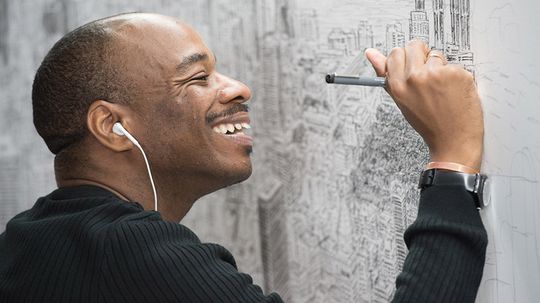 艺术家史蒂芬·威尔特郡（Stephen Wiltshire）从记忆中汲取了整个城市“border=