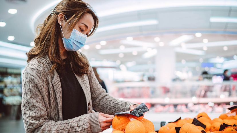 woman shopping in mask