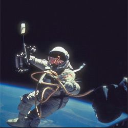 Astronaut Tethered to Spaceship
