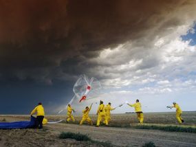 Members of S.T.E.P.S. (Severe Thunderstorm Electrification and Precipitation Study) launch a weather balloon into a tornadic supercell thunderstorm.