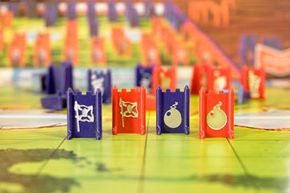 The immoveable Stratego pieces, bombs and flags, on the board.