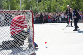 Prince William, Duke of Cambridge, takes a quick shot in a game of street hockey in Yellowknife, Canada.