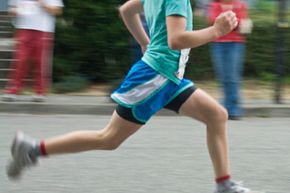 Boys exercising in motion with sport.