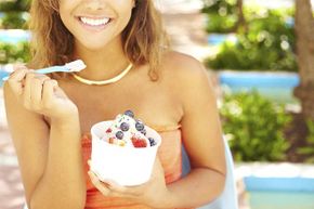 eating yogurt and fruit