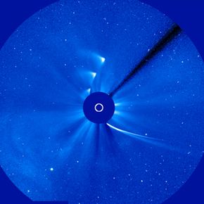 This time-lapse image shows comet Ison approaching and leaving during its slingshot around the sun (represented by the white circle) -- on Nov. 28, 2013. You can see the curve of the comet's orbit path. 