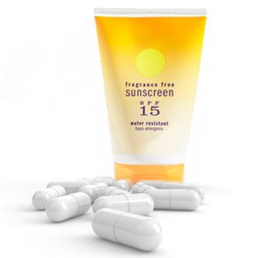 Sunscreen bottle and white capsules.