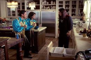 Singer Ozzy Osbourne hangs out with performing duo Donny and Marie Osmond in an image from a Pepsi commercial that aired during the 2003 Super Bowl.