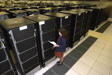 technican checks supercomputer