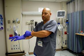 The rise of incidents of MRSA infections contracted in a health-care setting has caused some hospitals to invest in precautions like latex gloves that emit disinfectant.